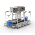 Compact hygienic gate with a washing agent dispenser and a sink